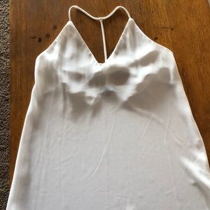 Timing 100% polyester tank. Dress up or down. New